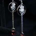 Sacred heart silver gothic punk earrings, with blood drop charm dangling from a chain.