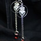 Sacred heart silver gothic punk earrings, with blood drop charm dangling from a chain.