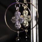 Gothic stainless steel earrings in silver with large hoops, gothic inspired charms and black beads dangling