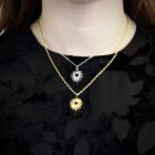stainless steel pendant necklace in gold and silver which features a sacred heart pendant with minimalist punk vibes