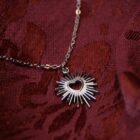 stainless steel pendant necklace in silver which features a sacred heart pendant with minimalist punk vibes