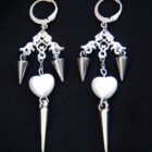Gothic punk stainless steel earrings in silver with spikes, heart pearls charms and intricate ornements.