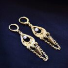Faerie witchy gold stainless steel earrings with dangling pearls, spikes and chains