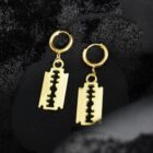 Cutthroat punk earrings with a razor blade charm in gold