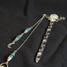 Metal original bookmark with flower ornaments, moon and mountain