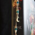 Metal original bookmark with flower ornaments, moon and mountain